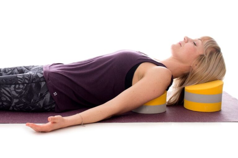 The Tall Buttafly provides gentle, ergonomic support in modified Savasana.