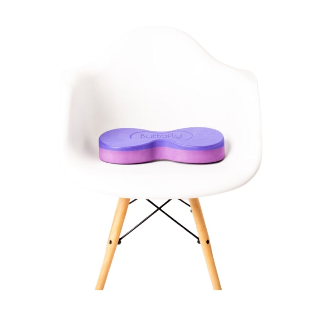 A Standard Buttafly on a flat-seated chair for chair yoga