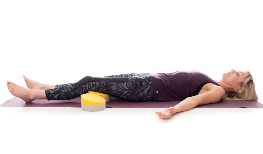 The Standard Buttafly supports the leg in modified Corpse Pose (Savasana) to provide comfort and ease.