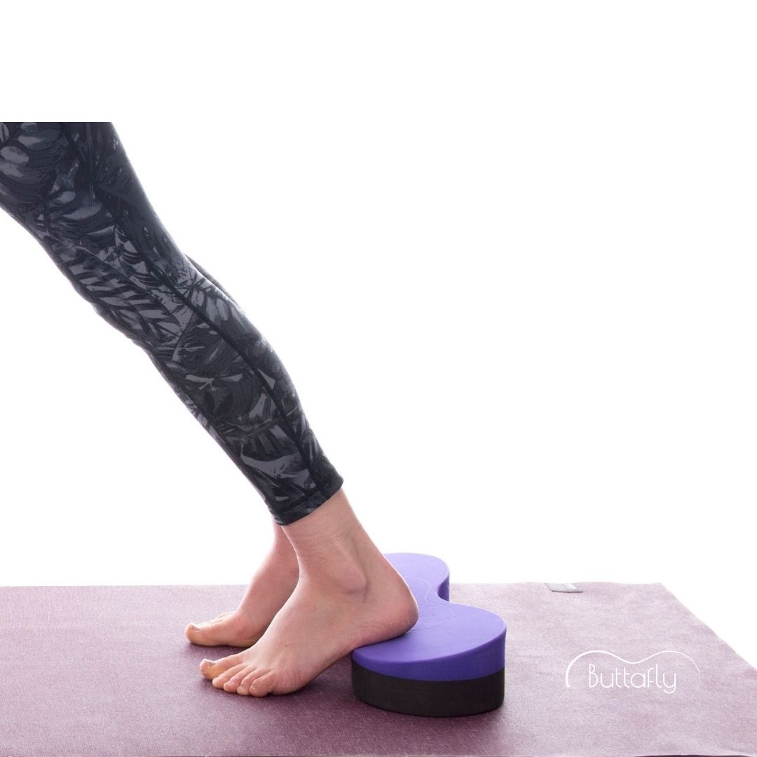 A demonstration of how to use a Standard Buttafly under the heels in supported Downward Dog (Adho Mukha Svanasana).
